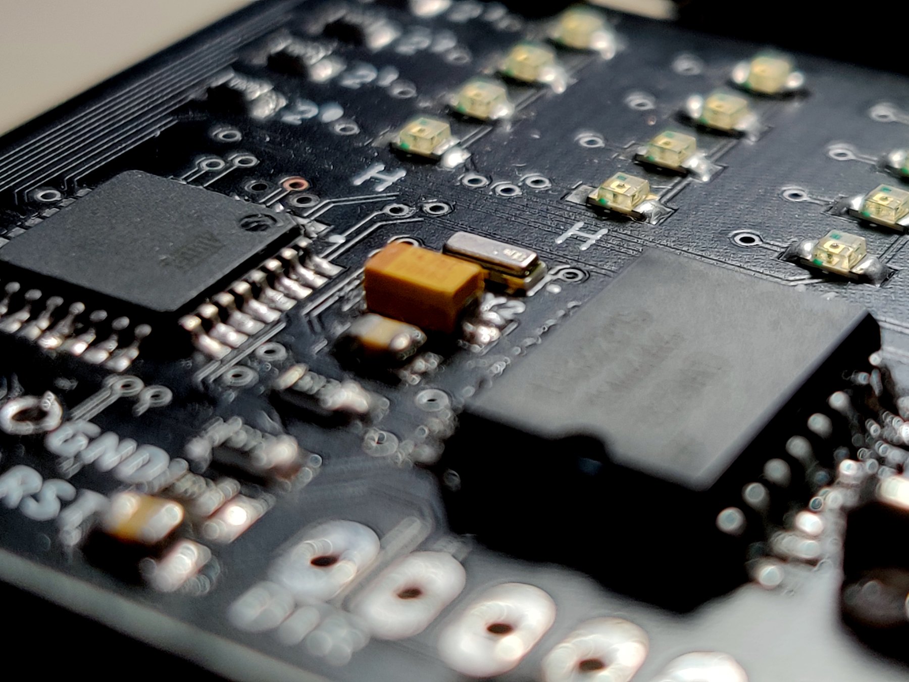 Macro photograph of components on the BinWatch PCB
